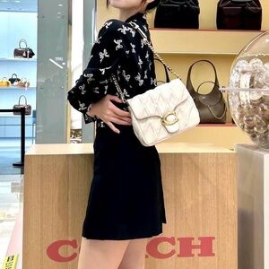 Coach quilted tabby square off white